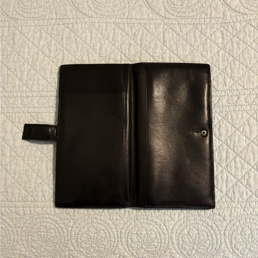Tumi travel wallet passport card organizer.